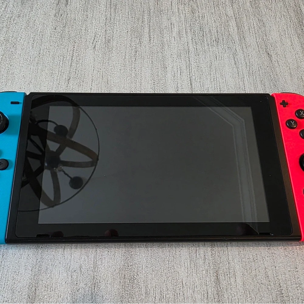 Nintendo Switch with Neon Blue and Neon Red Joy-Con - Handheld Gaming Console - Picture 2 of 9